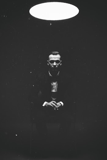 Silhouette of Man Wearing Suit Jacket and Pants