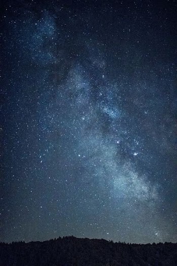 silhouette of mountain at nighttime