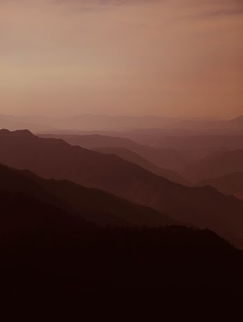 silhouette of mountain during golden hour