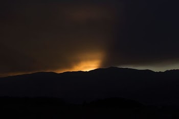 silhouette of mountain during sunset