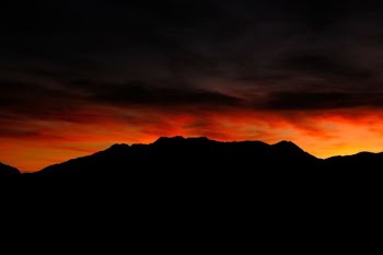 silhouette of mountain during sunset