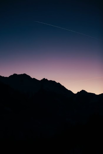 Silhouette of Mountain Under Blue Sky · Free Stock Photo