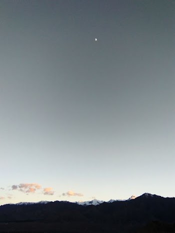 silhouette of mountain under gray sky