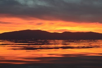 silhouette of mountains during sunset