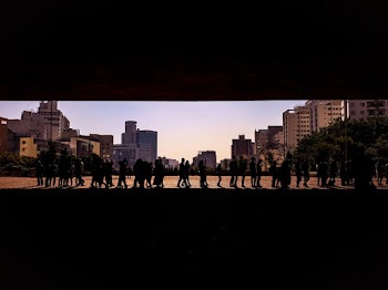 Silhouette of People In Queue