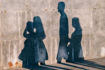 Silhouette of People Walking on Street