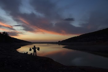 Silhouette of Person and Mountain Slope
