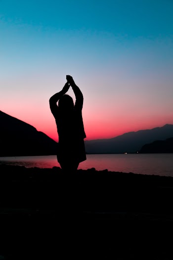 Silhouette of Person During Golden Hour