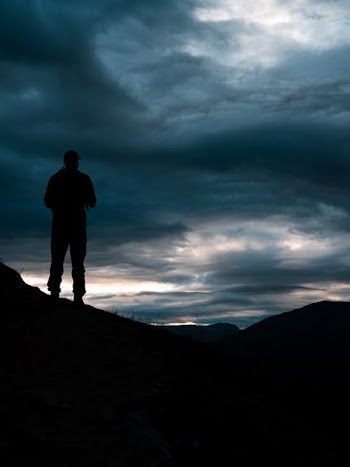 silhouette of person standing