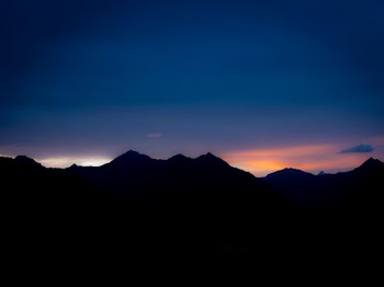 silhouette of rock mountains during golden hour