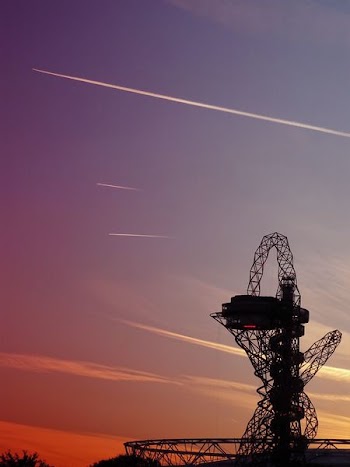 Silhouette of Roller Coaster during Sunset