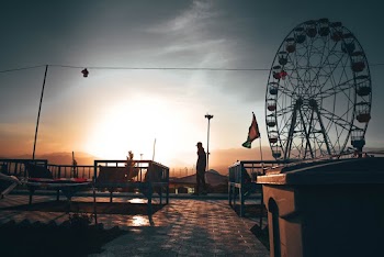 Silhouette of Standing Man in Recreational Park