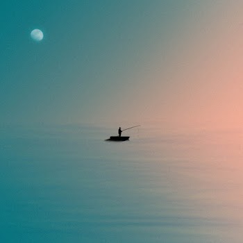 Silhouette Of Standing Man On Boat