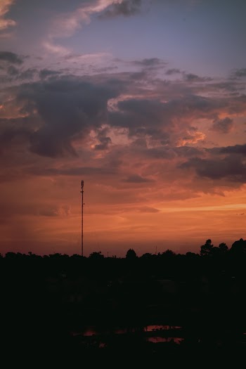 Silhouette of Tower during Sunset Photo