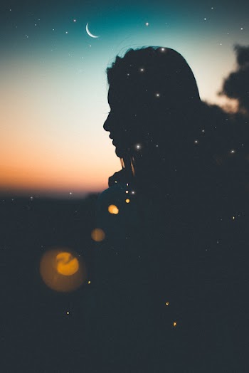 Silhouette of Woman During Dawn