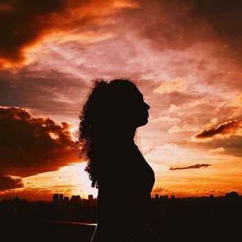 Silhouette of Woman during Golden Hour