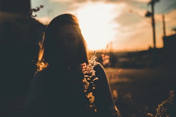 Silhouette of Woman during Sunset