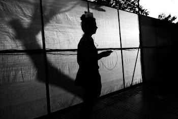 silhouette of woman wearing hat