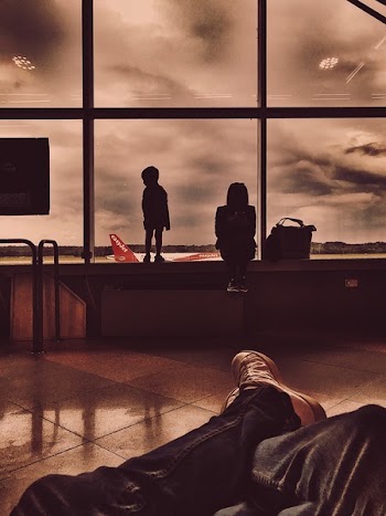 Silhouette Photo of a Person and Toddler 