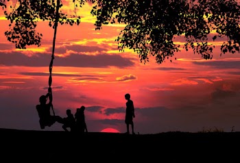 Silhouette Photo of Children Playing