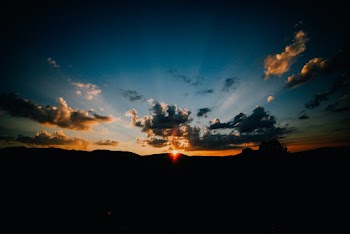 Silhouette Photo of Clouds During Golden Hour