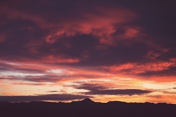 silhouette photo of mountain during golden hour