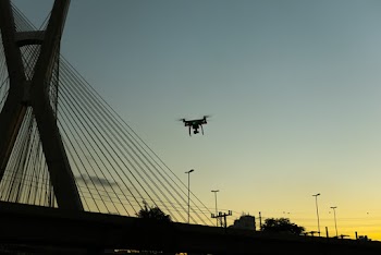 Silhouette Photo of Quadcopter
