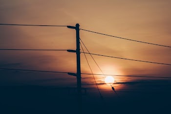 Silhouette Photo Of Utility Post