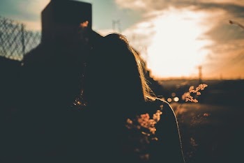 Silhouette Photograph of Woman during Golden Time