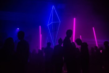 silhouette photography of people gathered inside bar
