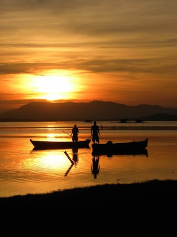Silhouette Photography Of People Riding On Boats