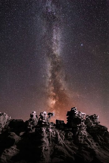 silhouette photography of rock formation