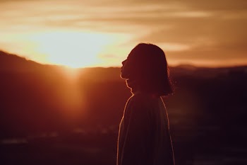 Silhouette Photography of Woman at Golden Hour