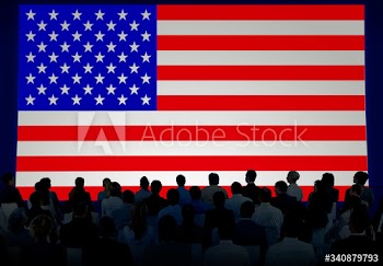 Silhouettes Of Business People Looking At The American Flag
