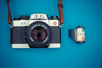 silver and black Leica DSLR camera