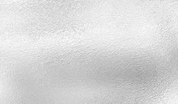 Silver background from metal foil on cardboard decorative texture