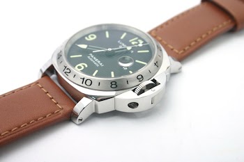 Silver-colored Analog Watch on White Surface