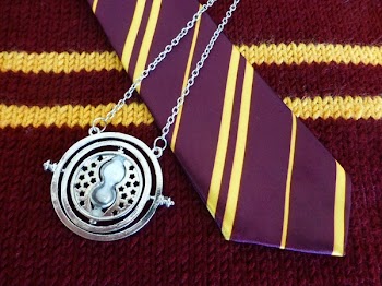 Silver-colored Necklace and Purple Necktie