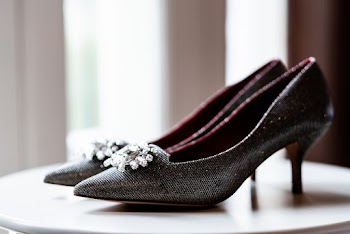 Silver Diamond Studded High Heels on White Table