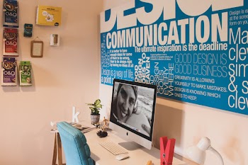 Silver Imac, Magic Keyboard, and Magic Mouse on White Wooden Table