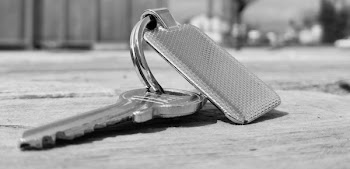 Silver Key on Floor