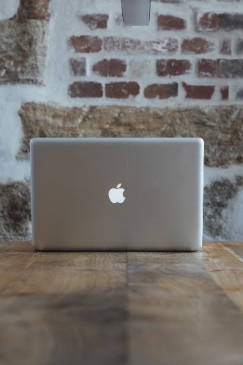 Silver Macbook on Table