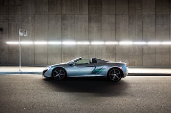 Silver Mclaren 650s Convertible Coupe on Gray Concrete Road