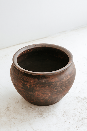 Simple Brown Ceramic Pot on White Floor