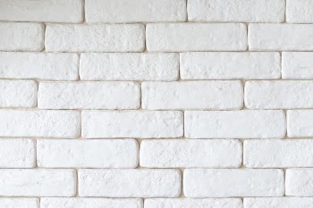 Simple white brick wall background Free Photo