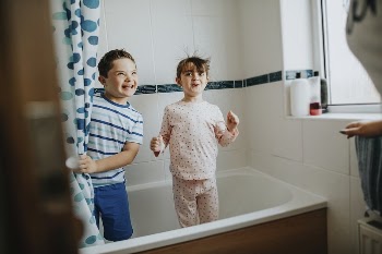 Sister and brother playing peekaboo | Free Photo - rawpixel