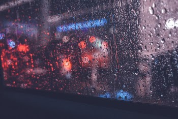 Sitting down in the backseat while waiting the rain washed away all the pain.