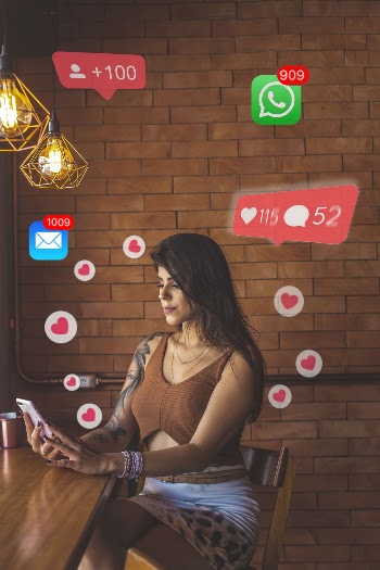 Sitting Woman Using Smartphone With Hearts and Smartphone Icons