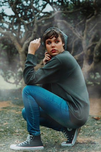 Sitting Woman Wearing Blue Denim Jeans