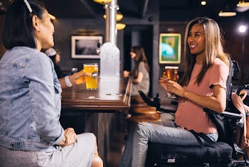 Sitting Woman Wearing Pink T-shirt